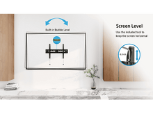 Charger l&#39;image dans la galerie, Une télévision fixée au mur blanc, avec un niveau à bulle et des instructions.
