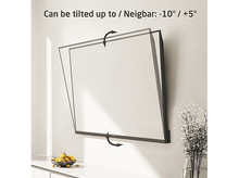 Charger l&#39;image dans la galerie, Écran de télévision monté sur un mur, montrant les options d&#39;angle d&#39;inclinaison avec un vase de fleurs blanches.
