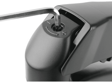 Charger l&#39;image dans la galerie, Un détail noir, une vis est serrée avec une clé Allen argentée sur fond blanc.
