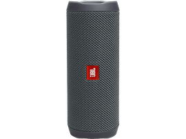 Enceinte grise JBL Flip 5, forme cylindrique, logo JBL rouge. Texture de grille. Dessus et dessous gris foncé.