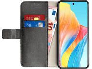 Un étui de téléphone noir ouvert avec un téléphone, des cartes et de l'argent.