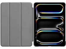 Charger l&#39;image dans la galerie, Un iPad ouvert avec un écran stylisé affichant un design abstrait coloré.
