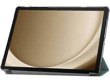 Charger l&#39;image dans la galerie, Tablette avec écran affichant un design doré, dans un étui gris foncé avec une couverture sarcelle.
