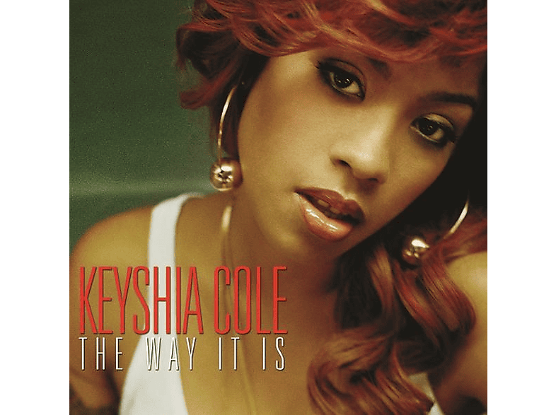 Pochette de l'album de Keyshia Cole. Elle porte un haut blanc, des boucles d'oreilles dorées et des cheveux roux. Le texte dit 'Keyshia Cole The Way It Is'.