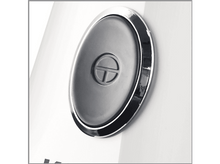 Charger l&#39;image dans la galerie, Gros plan d&#39;un bouton noir avec une bordure chromée et un &#39;T&#39; stylisé au centre.
