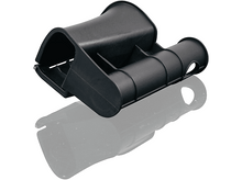 Charger l&#39;image dans la galerie, Outil en plastique noir avec un design incurvé. Il se reflète sur une surface blanche.
