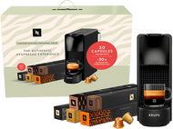 Une machine à café Nespresso avec des capsules et des tasses à café. La boîte dit 'Édition Limitée'.