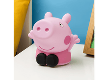 Charger l&#39;image dans la galerie, Jouet Peppa Pig rose. Pieds noirs et haut rose. Assis sur une surface blanche.
