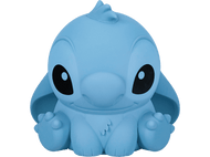 Figurine Stitch bleu clair. Grands yeux noirs, grandes oreilles, position assise.