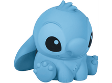 Charger l&#39;image dans la galerie, Une figurine bleue de Stitch assis avec de grandes oreilles et des yeux noirs.

