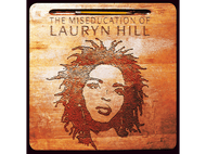 Pochette d'album : une surface en bois sculpté avec le visage d'une femme.