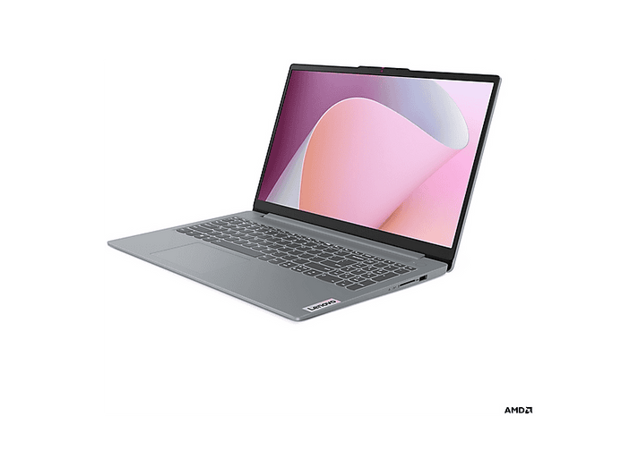 Un ordinateur portable Lenovo gris est ouvert, affichant un écran rose et blanc. Le clavier et le pavé tactile sont visibles. Logo AMD dans le coin.
