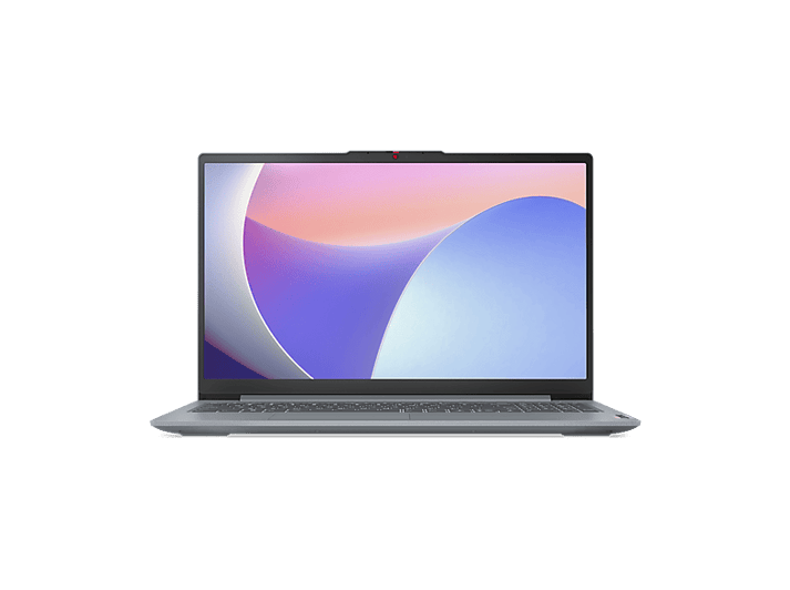 Un ordinateur portable gris avec un écran coloré sur fond noir. L'écran affiche un motif d'ondes violet et bleu.