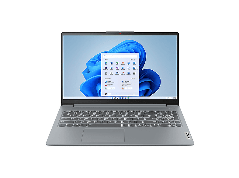 Un ordinateur portable Lenovo argenté est ouvert, affichant l'écran d'accueil de Windows 11. Le clavier est visible et l'écran affiche des icônes d'applications.