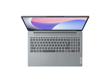 Charger l&#39;image dans la galerie, Vue de dessus d&#39;un ordinateur portable Lenovo gris. L&#39;écran est ouvert, montrant une image abstraite colorée. Le clavier est visible.
