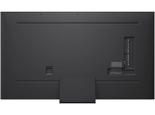 Charger l&#39;image dans la galerie, Dos d&#39;une grande télévision noire sur fond blanc. Le support est noir.
