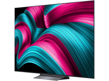 Charger l&#39;image dans la galerie, Un grand écran de télévision avec un design incurvé et des images abstraites.
