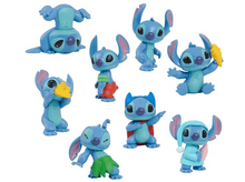 Charger l&#39;image dans la galerie, Une collection de figurines Stitch dans diverses poses.

