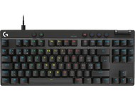 Clavier mécanique noir avec des touches blanches, avec diverses touches de fonction.