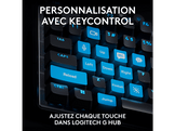 Gros plan sur le clavier, avec des touches bleues en surbrillance. Texte en français sur la personnalisation.