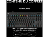 Clavier noir avec touches blanches, avec un câble de chargement noir en bas.