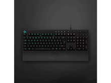 Charger l&#39;image dans la galerie, Clavier de jeu noir avec touches éclairées. Repose-poignets inclus. Éclairage RVB visible.
