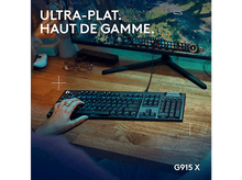 Charger l&#39;image dans la galerie, Personne utilisant un clavier et un moniteur, avec le texte G915 X en bas.
