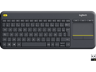 Clavier sans fil gris foncé avec pavé tactile et touches de fonction. Un récepteur USB est également visible.