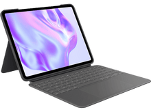 Charger l&#39;image dans la galerie, Un iPad gris avec un étui clavier. L&#39;écran affiche un design abstrait coloré.
