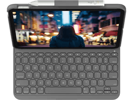 Tablette avec clavier, stylet et fond de ville sur l