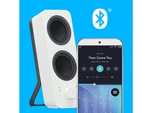 Charger l&#39;image dans la galerie, Haut-parleur blanc et smartphone avec icône Bluetooth sur fond bleu.
