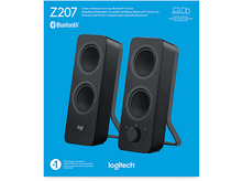 Charger l&#39;image dans la galerie, Deux enceintes noires, un logo et texte sur la connectivité Bluetooth. Icônes d&#39;appareils affichées.
