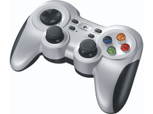 Charger l&#39;image dans la galerie, Manette Logitech argentée avec détails noirs, boutons et boutons d&#39;action colorés. Fond blanc.
