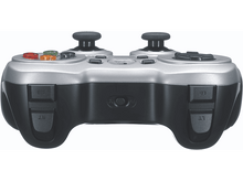 Charger l&#39;image dans la galerie, Une manette de jeu argentée et noire, boutons et joysticks visibles.
