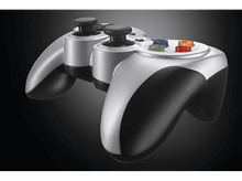 Charger l&#39;image dans la galerie, Manette de jeu argentée et noire. Avec boutons, joysticks et finition brillante. Fond noir.
