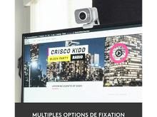 Charger l&#39;image dans la galerie, Webcam en haut d&#39;un moniteur affichant un site web avec texte et bouton de lecture.
