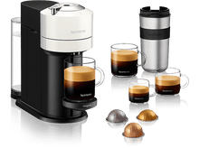 Charger l&#39;image dans la galerie, Machine à café Nespresso avec tasses à café, capsules et un mug de voyage sur fond noir.
