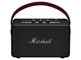 Un haut-parleur Marshall noir avec une poignée rouge. Il a des boutons dorés sur le dessus et la marque est visible.