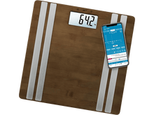 Charger l&#39;image dans la galerie, Balance numérique avec affichage du poids (64,2 kg) et smartphone avec graphique de suivi.
