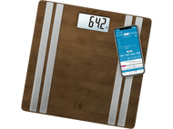 Balance numérique avec affichage du poids (64,2 kg) et smartphone avec graphique de suivi.