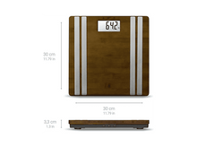 Charger l&#39;image dans la galerie, Un pèse-personne numérique avec un aspect bois brun. Affiche le poids en kilogrammes.
