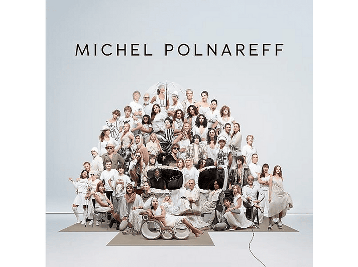 Un grand groupe de personnes d'âges et d'ethnies variés. Texte : Michel Polnareff.