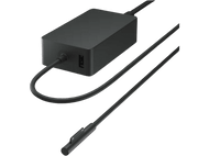 Adaptateur secteur noir avec un câble.