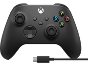 Manette Xbox noire avec boutons colorés, une croix directionnelle et un câble USB.