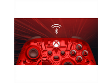 Charger l&#39;image dans la galerie, Gros plan sur une manette Xbox rouge. La manette possède des boutons, dont A, B, X et Y. Un logo Xbox blanc est visible.
