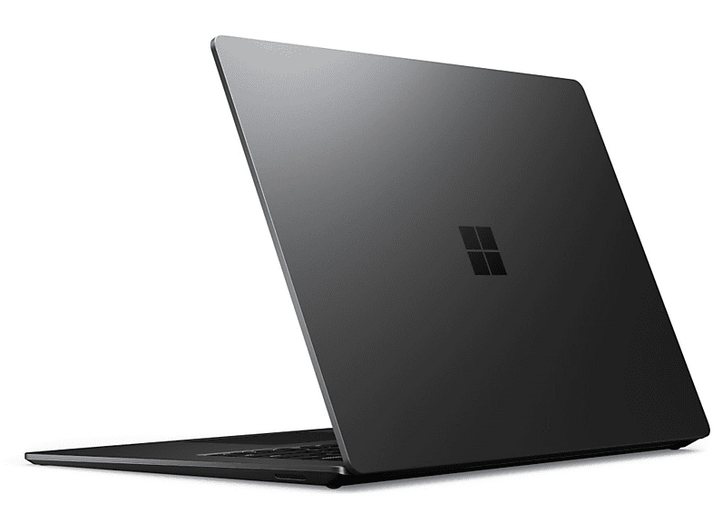 Ordinateur portable noir légèrement ouvert. Logo Microsoft visible à l'arrière. Sur fond blanc.