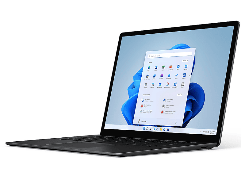 Un ordinateur portable noir affichant l'interface Windows 11. L'écran montre le menu Démarrer avec diverses icônes d'applications.