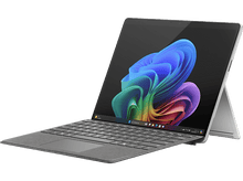 Charger l&#39;image dans la galerie, Ordinateur portable : Argenté, ouvert. Affiche une image abstraite colorée. Clavier attaché.
