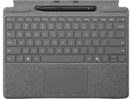 Clavier gris avec pavé tactile et stylet dessus. Fond blanc.