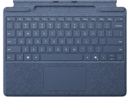 Clavier bleu avec pavé tactile. Lettres et chiffres visibles. Fond noir.